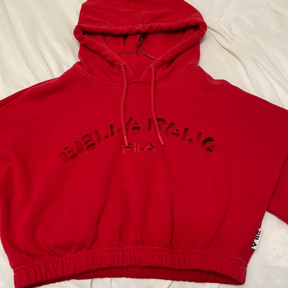 Cropped hooded Fila sweatshirt.
